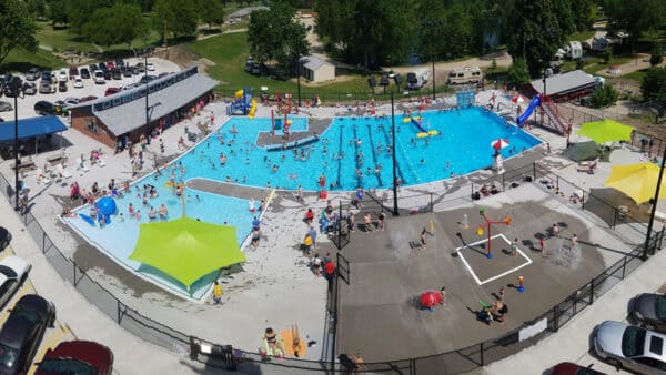 sibley waterpark with a crowd swimming and playing